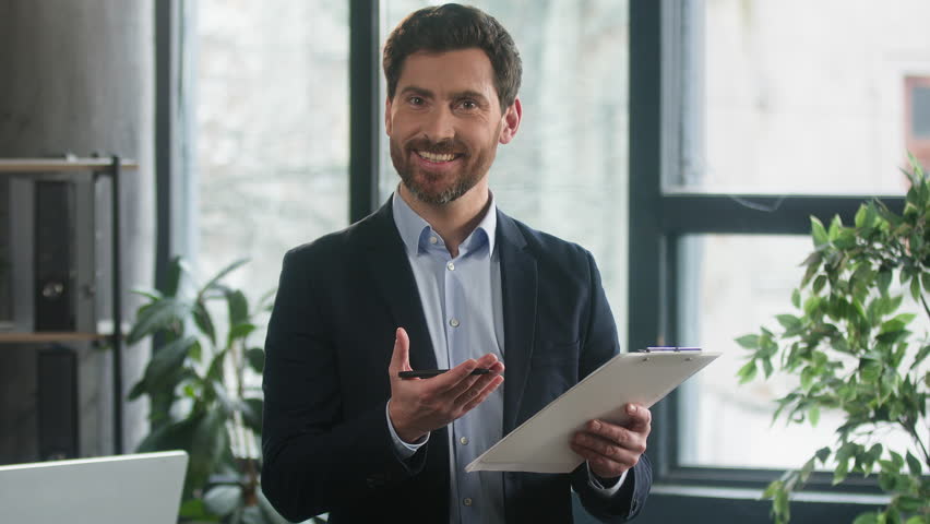 Caucasian male businessman employer HR manager recruiter candidate employee consultant manager write questionnaire man developer planning workflow creating plan in office writing notes in note tablet