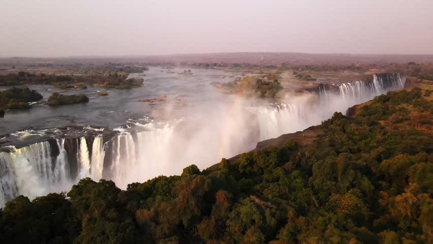 Victoria Falls, Zimbabwe, Aerial, Drone, Sunrise Royalty-Free Stock Footage #3428771929