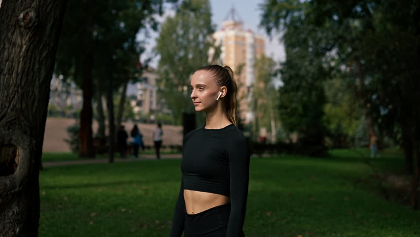 Portrait of a professional athlete girl who shows how do exercises incorrectly and not necessary