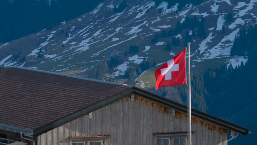 Swiss flag at a ski resort in the Swiss Alps