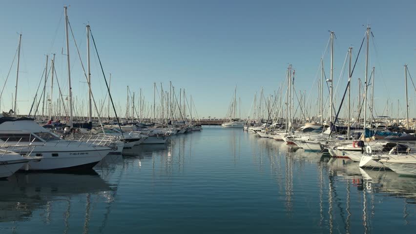 Tranquil sunny morning in the yacht marina in Spain.