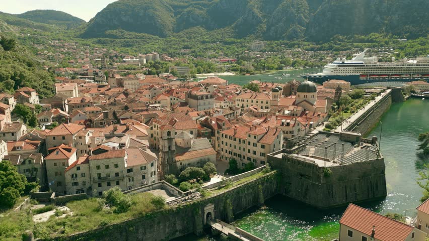 Aerial view of the Old Town and famous Fortress of Kotor in Montenegro Royalty-Free Stock Footage #3429036595