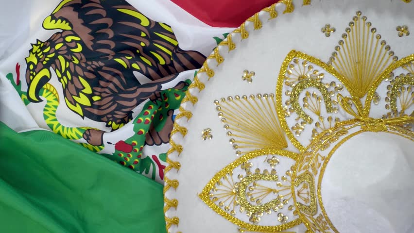 Mexican hat spinning on mexican flag. Cinco de Mayo background. Royalty-Free Stock Footage #3429137563