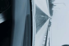  It’s a winter highway, driving a car, a road path, a long car path, a person is driving along the road. Vertical video.