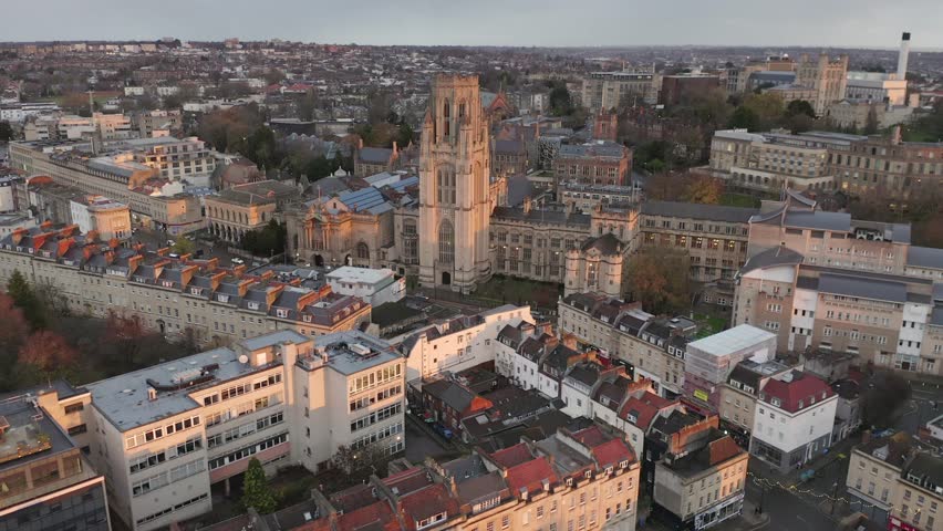 Aerial shot of the University of Bristol in central Bristol, UK showing Park Street and a sunlit Wills Memorial Building Tower 