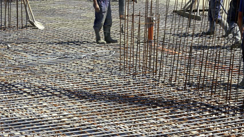 High Rise Concrete Pumping at Construction Site. Pouring Concrete on Formwork for Reinforced Concrete Floors. Workers at Construction Site. Construction Worker Pouring Concrete with Pump Tube.  Royalty-Free Stock Footage #3429637675