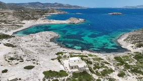 Aerial drone video of small chapel of Faneromeni in Southern part of Antiparos island, Cyclades, Greece