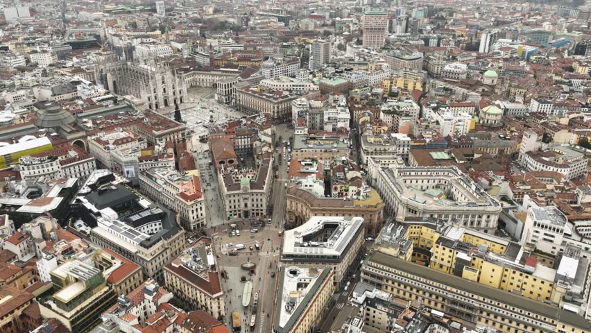 Aerial view of Piazza Duomo in front of the Gothic cathedral in the center in 4k