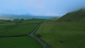 Cinematic aerial video of the mist over the hills in Yorkshire Dales