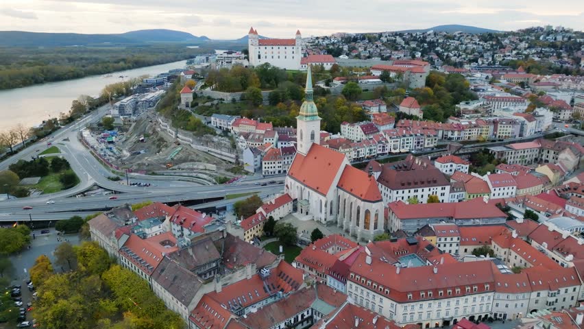 Aerial panoramic drone view of the Castle and Cathedral of St. Martin in the center of Bratislava.