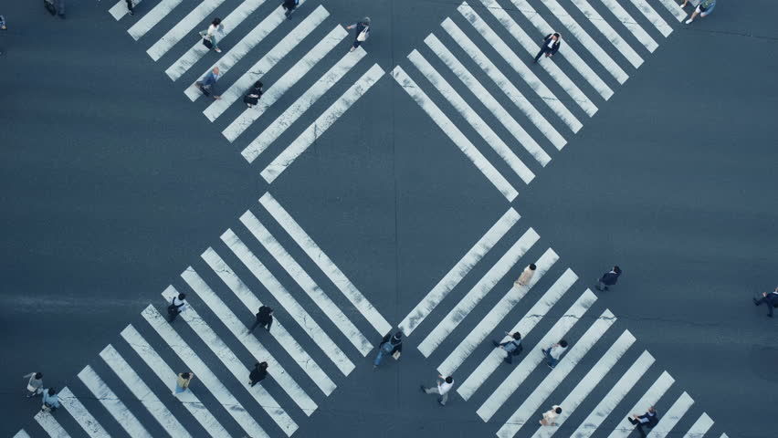 Aerial view of pedestrians walk crossing road intersection junction in downtown. Tokyo, Japan. Royalty-Free Stock Footage #3429814465
