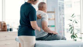 Physical therapy, back massage and physiotherapist with senior man in medical office at clinic. Rehabilitation, patient and healthcare worker helping elderly male person healing muscle pain of injury - Powered by Shutterstock - Get 15% off with code: PIKWIZARD15