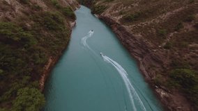 FPV shooting in the mountains of Dagestan, fpv shooting of boats on the river in the mountains, Sulak canyon in Dagestan, aerial photography of boats in the canyon of Dagestan, nature of Dagestan, aer