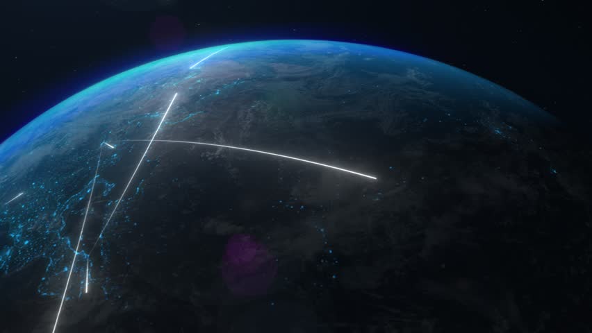 A satellite view of the world, with white lines indicating flows of information transfers, travel or business directions across the globe. The interconnectedness, complexity, communication.