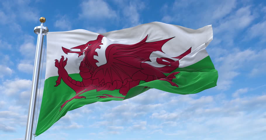 Wales flag with flagpole waving in wind, rolling clouds background looping, 4K video (Perfect Loop) Royalty-Free Stock Footage #3430064445