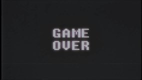 retro videogame GAME OVER text on computer old tv glitch interference noise screen animation seamless loop - New quality universal vintage motion dynamic animated background colorful joyful video