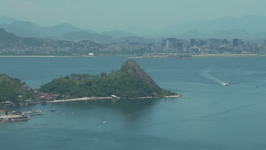 panoramic view of the niterói waterfront with the mountains of rio de janeiro in the background and guanabara bay, considered one of the most beautiful landcapes in the world.