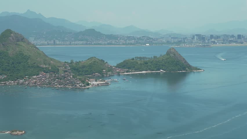 panoramic view of the niterói waterfront with the mountains of rio de janeiro in the background and guanabara bay, considered one of the most beautiful landcapes in the world.