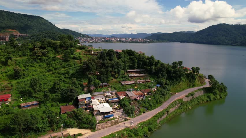 Picturesque aerial landscape of Phewa Lake and Pokhara City at the foothills of Annapurna mountain in Nepal