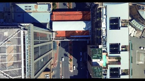 Aerial view of 5th Street in Sandton, Johannesburg. The video shows cars on 5th Street, as well as some of the buildings; including parts of Sandton City mall & Nelson Mandela Square.
