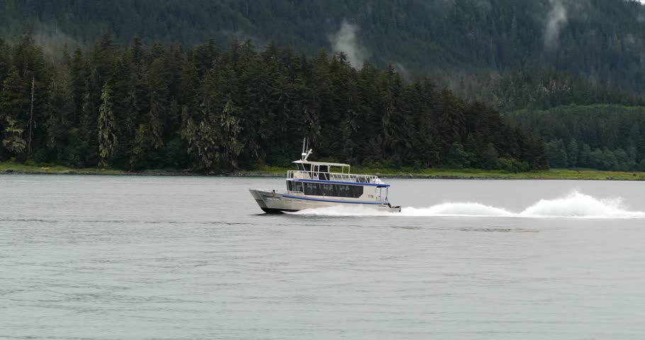 Small boat sailing on Gastineau Channel, Juneau, Alaska Royalty-Free Stock Footage #3430294759