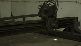 Laser precision unfolds: Watch as sheets of metal yield to the precise dance of cutting light in this captivating stock footage clip.