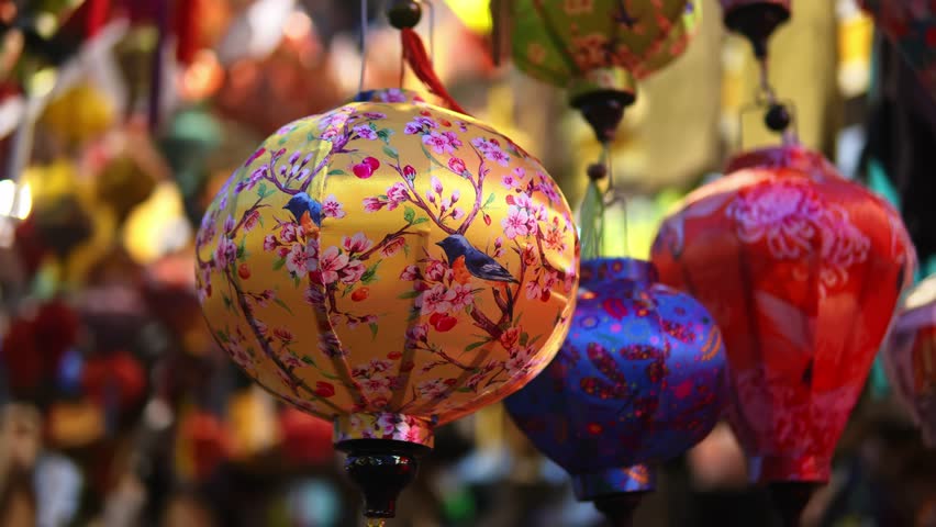 Traditional decorations for Chinese New Year decorative paper lanterns for the holiday. The Vietnamese city of Hoi An is decorated with glowing multi-colored lanterns for classic Asian winter holidays