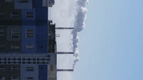 vertical Timelapse smoke from a chimney of a thermal power plant. Air pollution