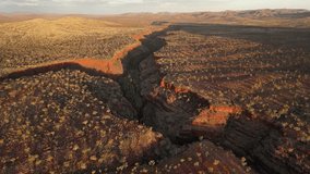 Canyon intersection at Dales Gorge during sunset in Karijini National Park in Western Australia, aerial high altitude - Powered by Shutterstock - Get 15% off with code: PIKWIZARD15
