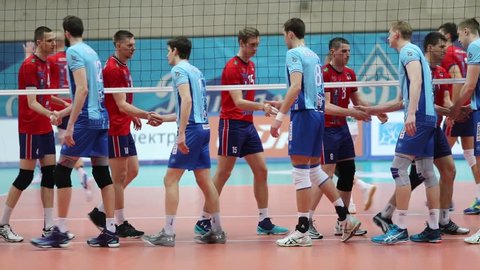 MOSCOW - APR 8, 2017: (slow motion) Teams greet before volleyball game Dynamo (Moscow) and Nova (Novokuibyshevsk) in Palace of Sports Dynamo