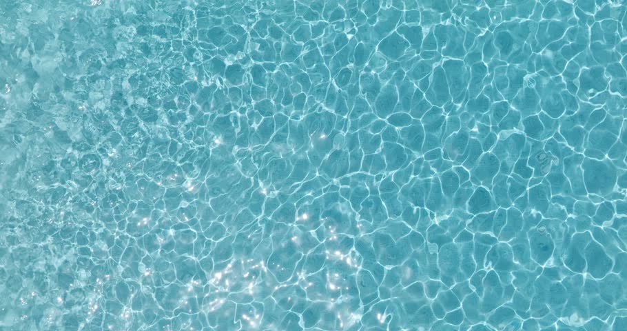 Blue water in the swimming pool with light reflections. Royalty-Free Stock Footage #3430400767