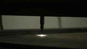 Laser precision in action: Watch a blaster machine effortlessly cut through sheet metal in this vivid stock footage clip.