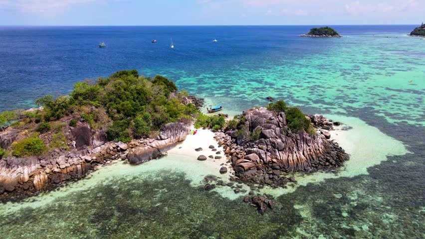a couple of men and women at Kla Island Koh Lipe Thailand is a small island on the coast of Ko Lipe with a coral reef great snorkeling place Royalty-Free Stock Footage #3430488677
