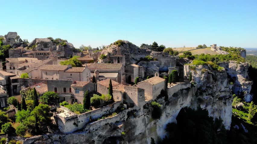 View of Les Baux-de-Provence, Provence, France, Drone view of rock in the heart of the Alpilles the Chateau des Baux historical Unesco village
