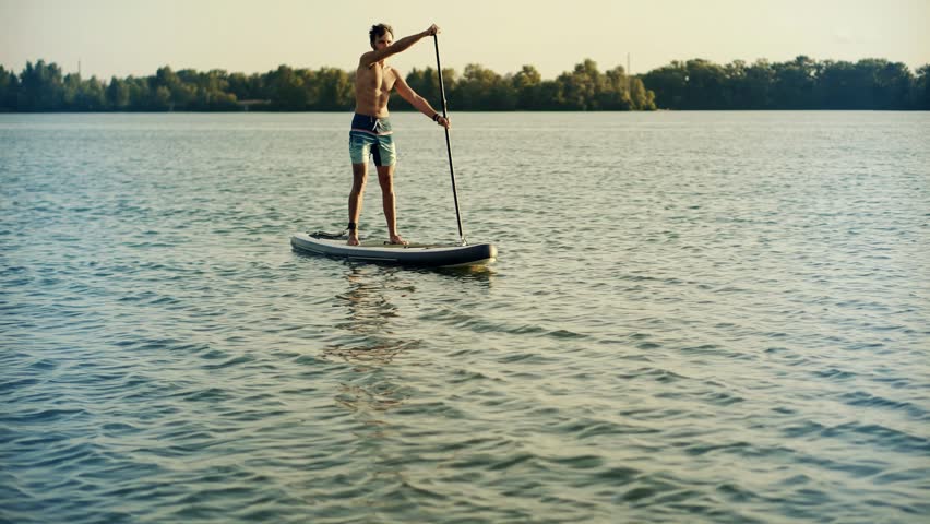 Paddleboarder Sport Sup Surfing. Recreation Paddling Sup Surfboard. Inflatable Board Rowing. Surfer Recreation Sport Watersport Activity. Water Tourism Recreation.Raft SUP. Paddler Surfing Exploration Royalty-Free Stock Footage #3430628009
