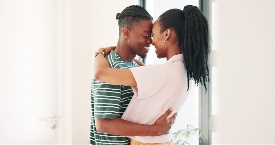 New home, property and happy couple for dance in living room, front door and love in real estate. Black people, forehead touch or celebrate for moving, care or bonding together in house investment Royalty-Free Stock Footage #3430703241