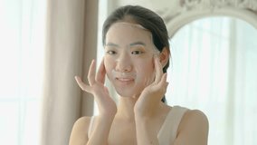 Beautiful young asian woman applying sheet facial mask and looking mirror at home, Girl applying cosmetic and makeup with skincare face for wrinkle, treatment and moisturizer, health and wellness - Powered by Shutterstock - Get 15% off with code: PIKWIZARD15