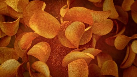 Super Slow Motion Shot of Premium Potato Chips And Seasoning Powder Explosion at 1000fps. Stock-video