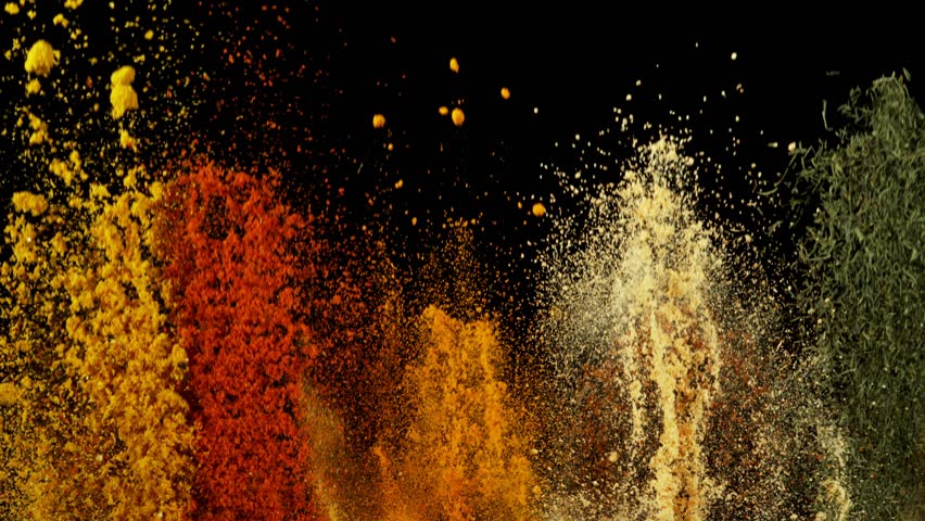 Super Slow Motion Shot of Colorful Explosion of Various Spices on Black Background at 1000fps.