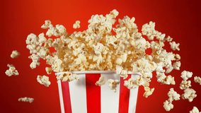 Super Slow Motion Shot of Fluffy Popcorn Exploding from Bucket at 1000fps. - Powered by Shutterstock - Get 15% off with code: PIKWIZARD15
