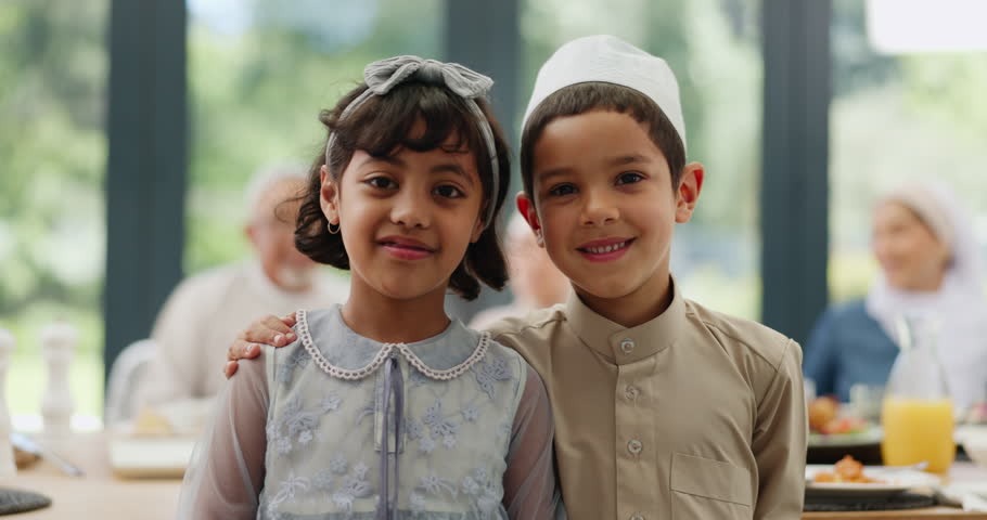 Muslim, boy and girl children or hug in home with family for eid, islamic celebration and happy. Ramadan, culture and portrait of kids at religious gathering with love, embrace and smile for bonding Royalty-Free Stock Footage #3431067261