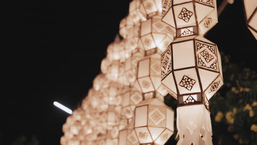 Beautiful hanging Lanna lanterns in Yi Peng festivities celebration at Chiang Mai Province, Thailand. Antique paper lantern Lanna style decoration during Loy Krathong festival. Slow motion shot.