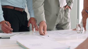 Executive business team people group working with paperwork standing at table, analyzing corporate strategy concept, reviewing plan, managing financial project overview at office meeting, close up. - Powered by Shutterstock - Get 15% off with code: PIKWIZARD15