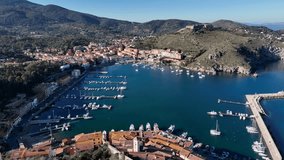 Porto Ercole, exclusive seaside tourist resort in Tuscany, Monte Argentario, Italy.
Aerial view of the port of Porto Ercole on Monte Argentario.