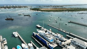 Aerial video of Singer Island, Blue Heron Bridge and Yachts at Safe Harbor Marina Florida