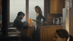 Romantic tourist couple discuss dish and cook together in holiday house kitchen. Big traveler family stopped to rest in wooden cottage during vacation trip. Concept of tourism and active leisure. - Powered by Shutterstock - Get 15% off with code: PIKWIZARD15