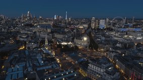 Stunning view, whole city, Aerial View Shot of London UK, United Kingdom, Trafalgar Square, London Eye, London Skyline at night evening