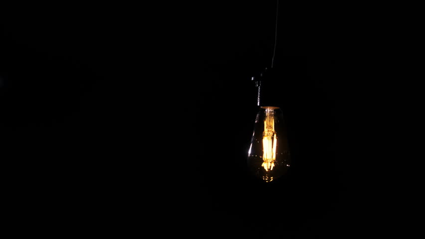 La Bombilla De Luz Eléctrica Sin Luz Sobre El Fondo Negro Fotos