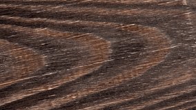 Aged brown textured wooden board surface close up. Rotation. Top view - Powered by Shutterstock - Get 15% off with code: PIKWIZARD15