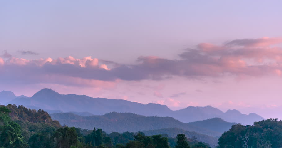 Timelapse Mountain landscape foggy windy range mountain green landscape asian farm. Beautiful landscape mountain green field meadow white cloud blue sky on sunrise. Countryside sunlight heaven